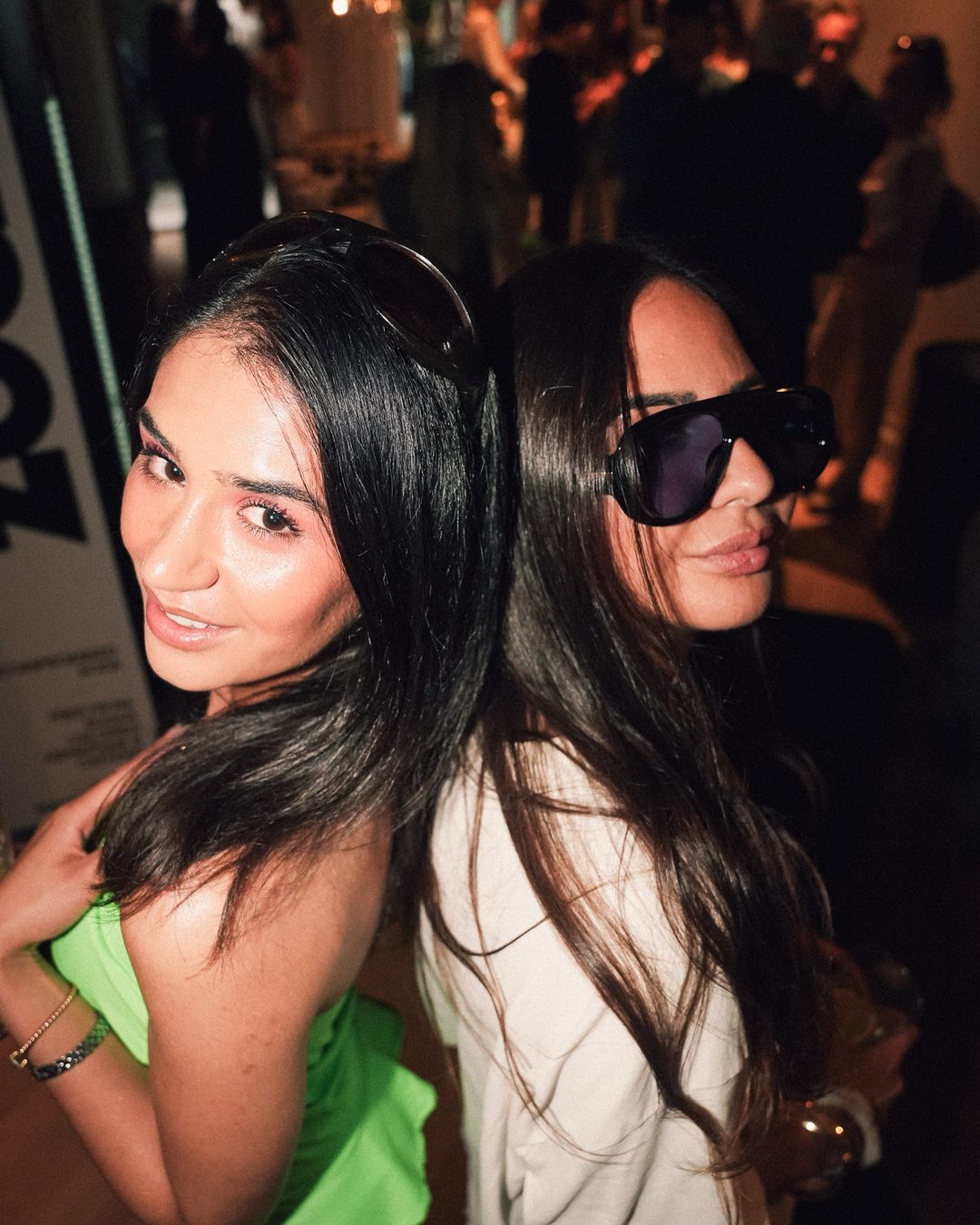 Two friends posing together on the dance floor, Seraya AW1 party — photo by vinny.mp4, Stockholm